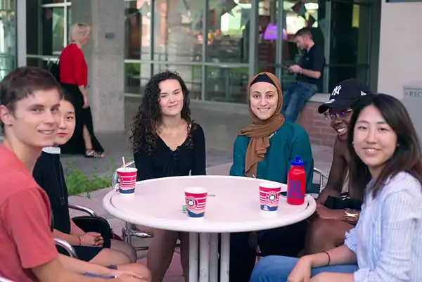 Students seated at a table