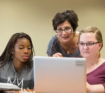 Teacher with students